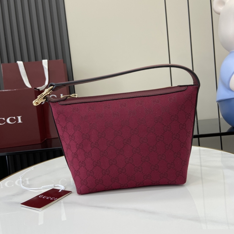 G*u*i top handle bags
